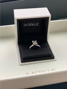 Silver Solitaire Engagement Ring with Clear Stone